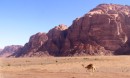 Wadi Rum Jebels * The mountains in the Wadi Rum, called Jebels.  They are a beautiful red sandstone and rise dramatically out of the flat desert floor. * 720 x 436 * (84KB)